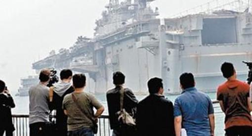 中国决定对美国有关非政府组织进行制裁，暂停美军舰机赴港休整的申请